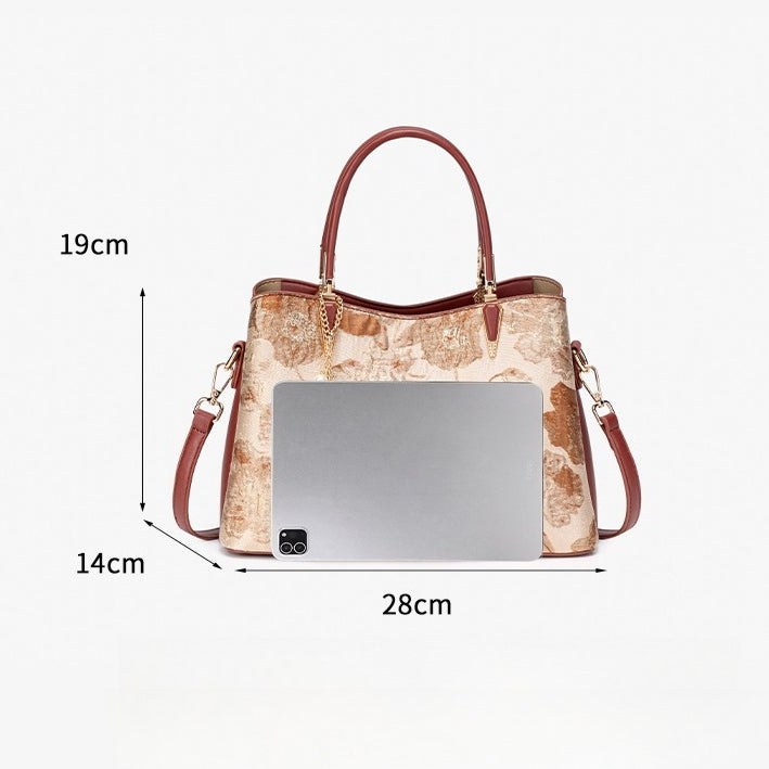 Quiet Luxe Floral Vegan Eco-Leather Clutch Bag with Leaf Charm