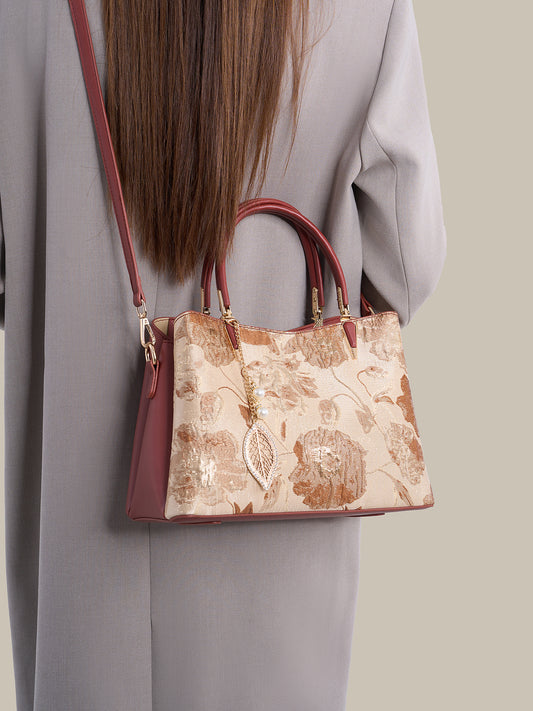 Quiet Luxe Floral Vegan Eco-Leather Clutch Bag with Leaf Charm