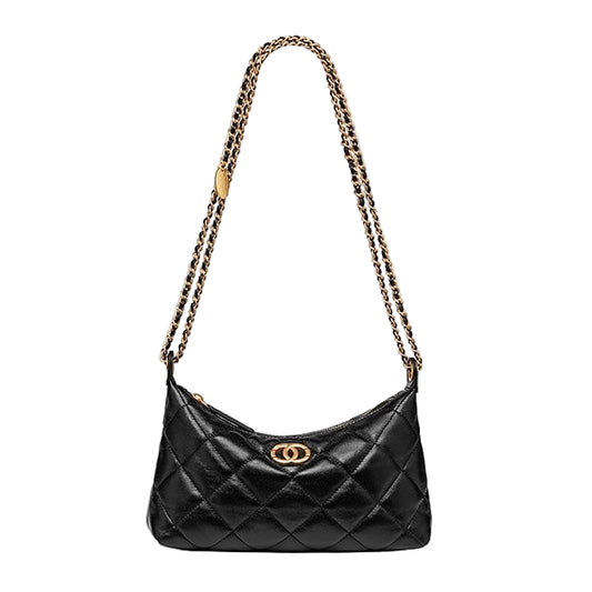 Black quilted handbag with gold chain strap on a white background