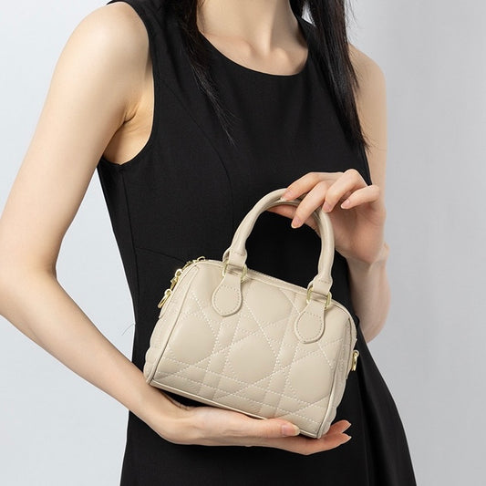 Bolso de mano Boston acolchado de cuero genuino para mujer