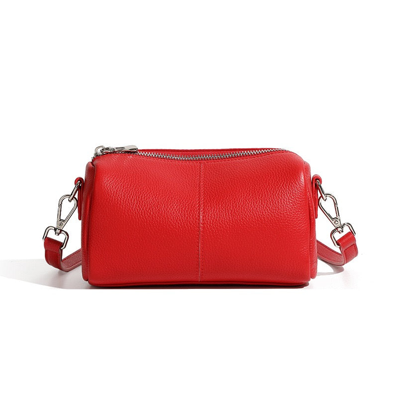 Damen-Clutch aus weichem Rindsleder mit Top-Grain-Muster, zylinderförmig