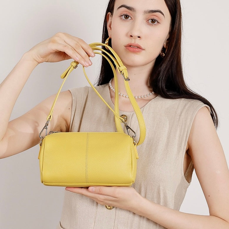 Damen-Clutch aus weichem Rindsleder mit Top-Grain-Muster, zylinderförmig