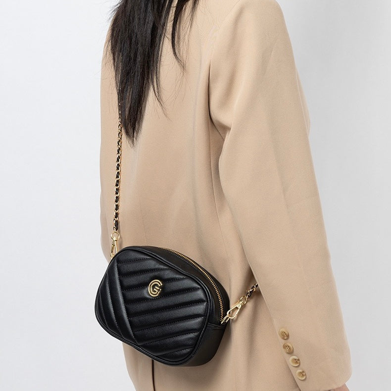 Runde Retro-Tasche aus echtem Leder für Damen