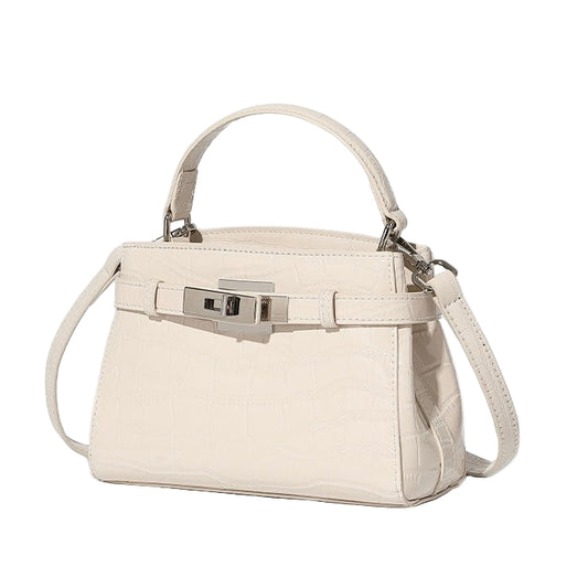 White handbag with silver hardware on a white background