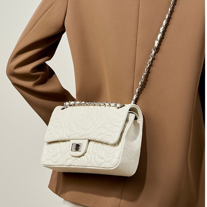 Bolso bandolera acolchado de piel auténtica de oveja para mujer con cadena y camelia