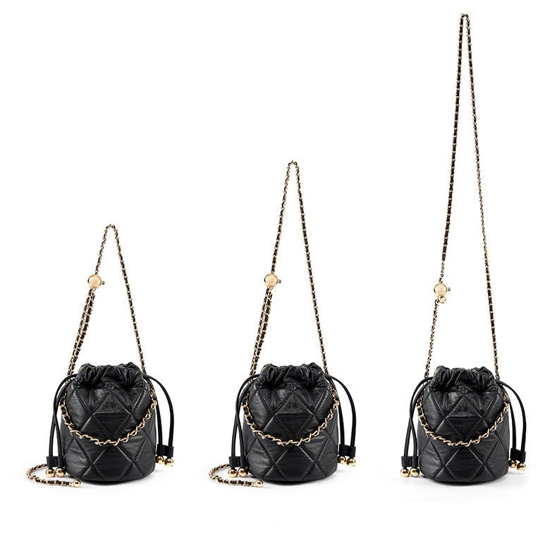 Bolso tipo cubo elegante de cuero genuino para mujer con correa de cadena