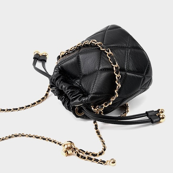 Bolso tipo cubo elegante de cuero genuino para mujer con correa de cadena