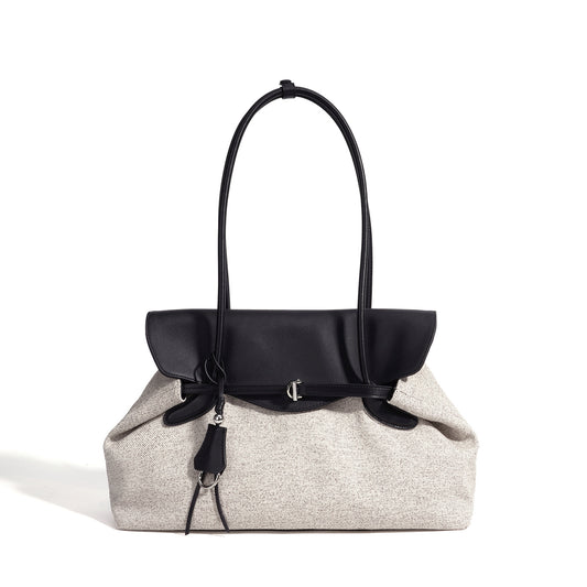 Zachte canvasclutch met ruime capaciteit en flap