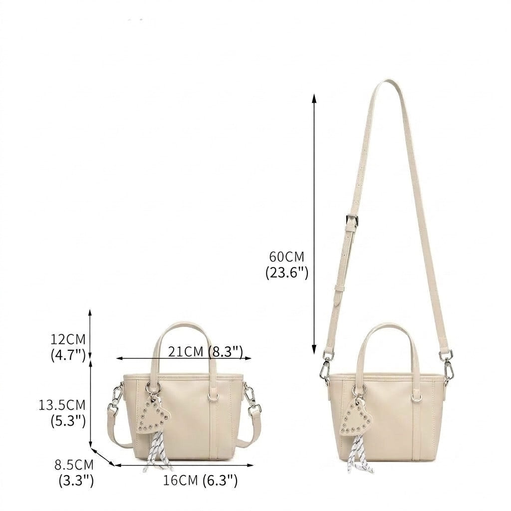 Mini tote a tracolla in vera pelle scolpita con distintivo cuore
