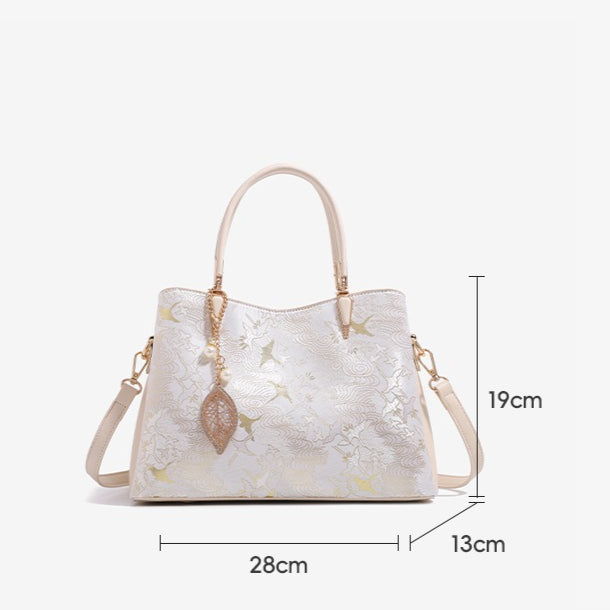 Sophisticated Oriental Jacquard Vegan Eco‑Leather Clutch Bag with Leaf Charm