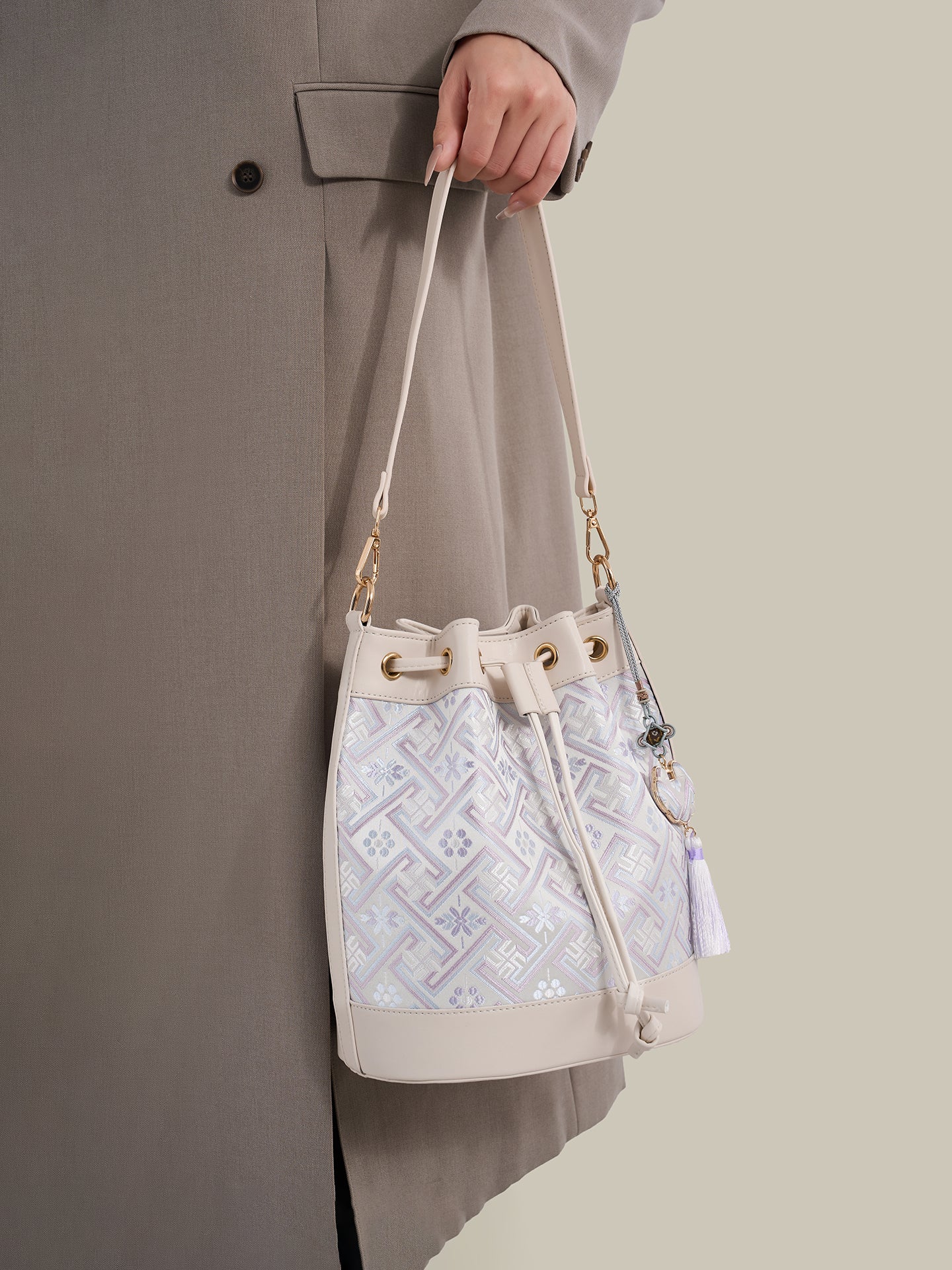 Gentle Oriental Brocade Vegan Eco-Leather Bucket Clutch Bag with Tassel Charm