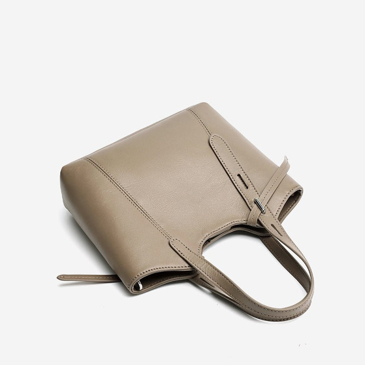 Sleek Genuine Leather Mini Bucket Clutch Bag with Adjustable Straps