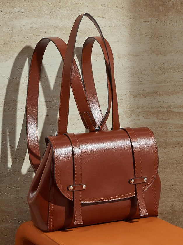 The Oil-Waxed Genuine Leather Convertible Flap Backpack Shoulder Bag