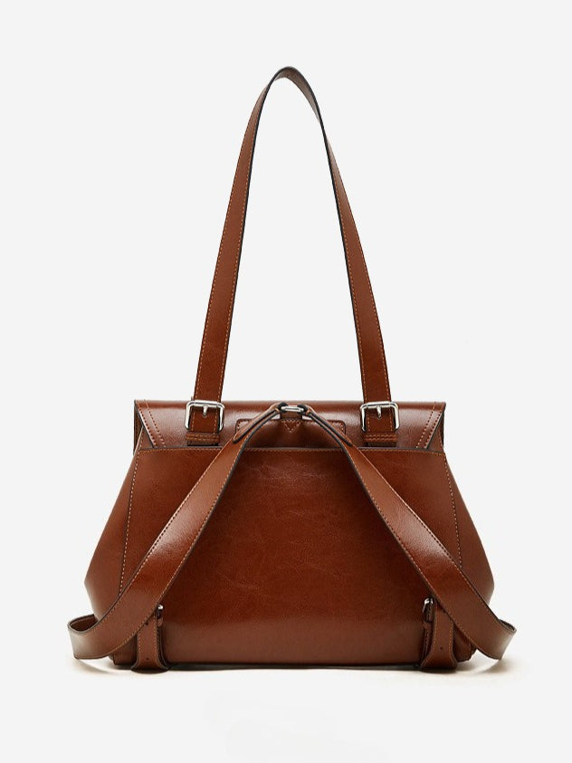 The Oil-Waxed Genuine Leather Convertible Flap Backpack Shoulder Bag