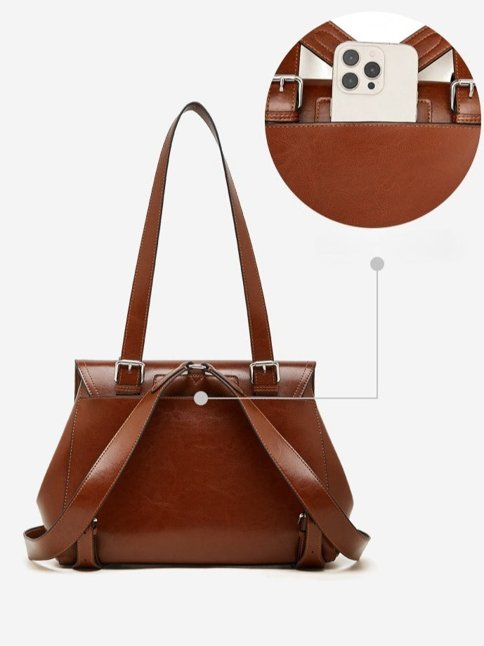 The Oil-Waxed Genuine Leather Convertible Flap Backpack Shoulder Bag
