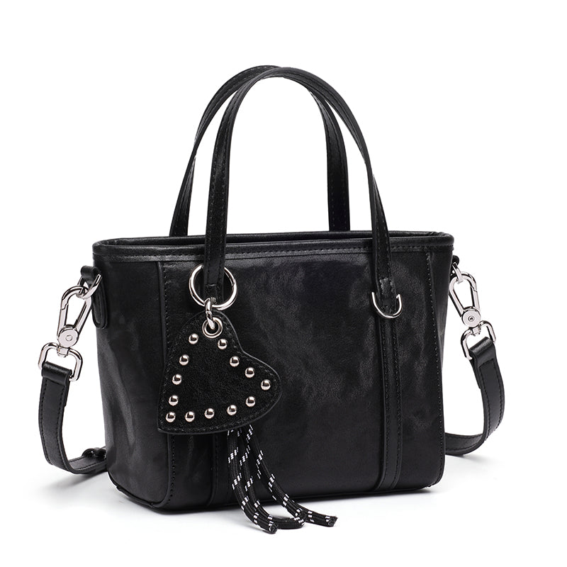 Mini tote a tracolla in vera pelle scolpita con distintivo cuore