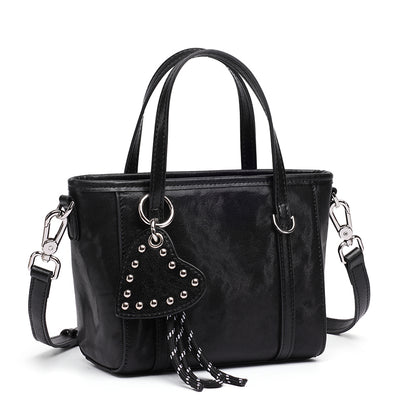 Mini tote a tracolla in vera pelle scolpita con distintivo cuore