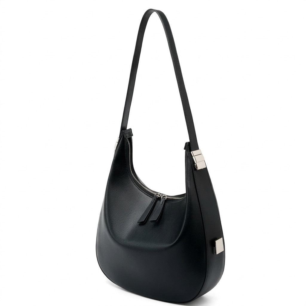 Borsa a tracolla a mezzaluna minimalista in vera pelle