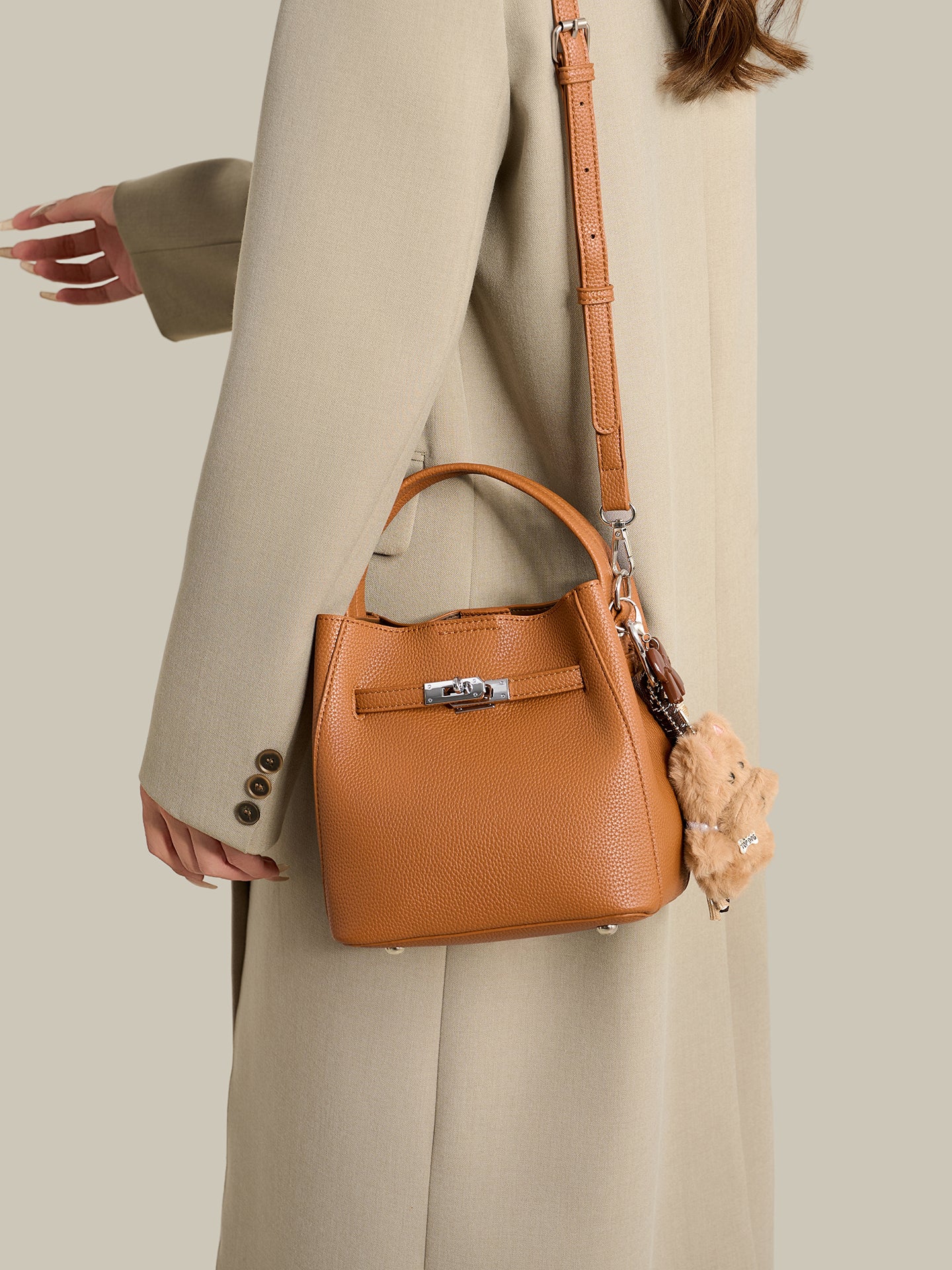 Mellow Pebble Textured Vegan Eco-Leather Bucket Bag with Fluffy Puppy Charm