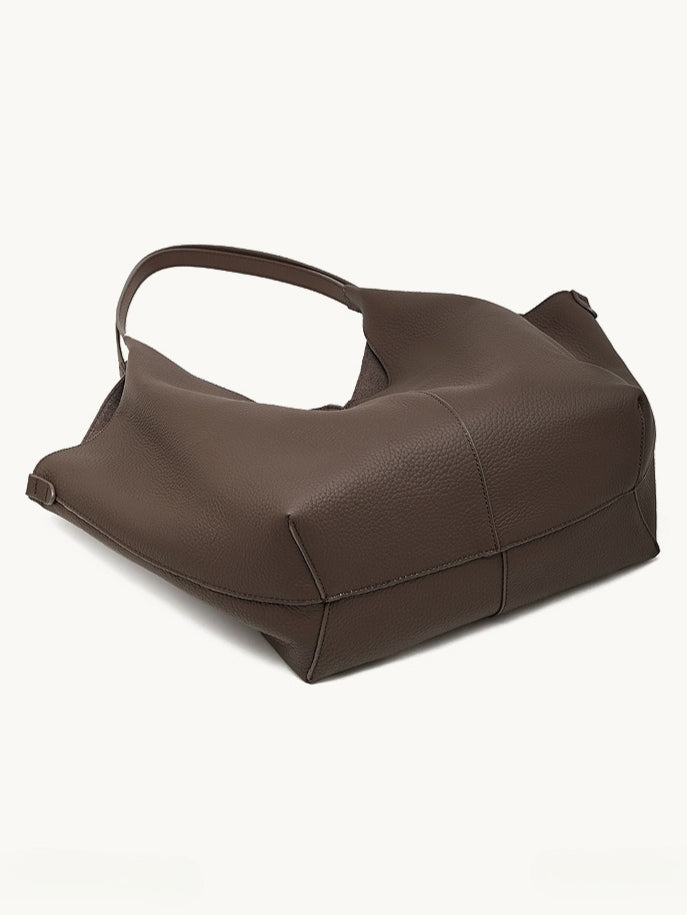 حقيبة إيثيرال في-كات جلد طبيعي | حقيبة هوبو بسيطة من جلد الحصى