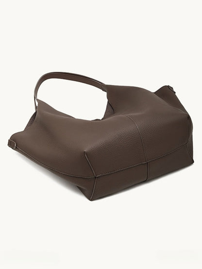 حقيبة إيثيرال في-كات جلد طبيعي | حقيبة هوبو بسيطة من جلد الحصى