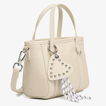 Sculpted Genuine Leather Mini Tote Crossbody Bag with Signature Heart Charm