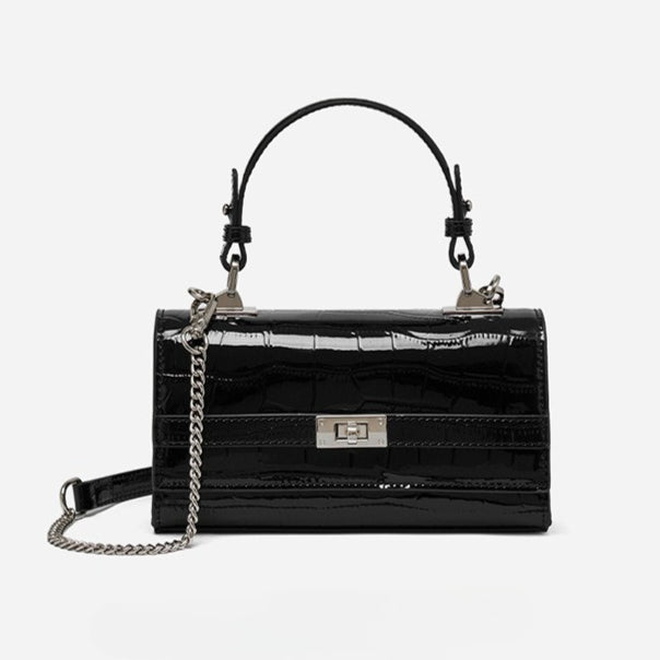Bolso clutch sobre vintage de cuero genuino con acabado brillante tipo cocodrilo
