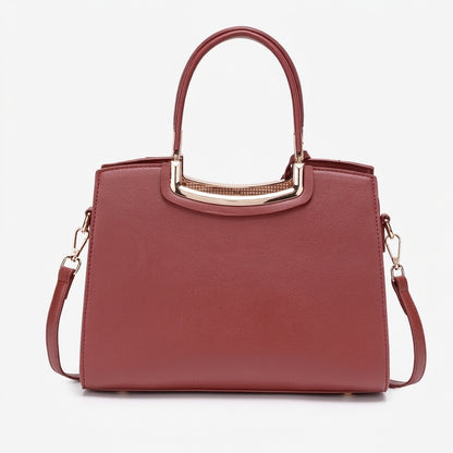 Borsa pochette elegante con fiori, ecopelle vegana e charm rotondo in metallo