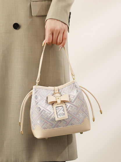 Delicate Geometric Vegan Eco-Leather Petite Bucket Clutch Bag with Bow Knot Charm