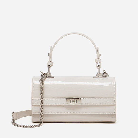 Bolso clutch sobre vintage de cuero genuino con acabado brillante tipo cocodrilo