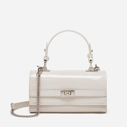Bolso clutch sobre vintage de cuero genuino con acabado brillante tipo cocodrilo