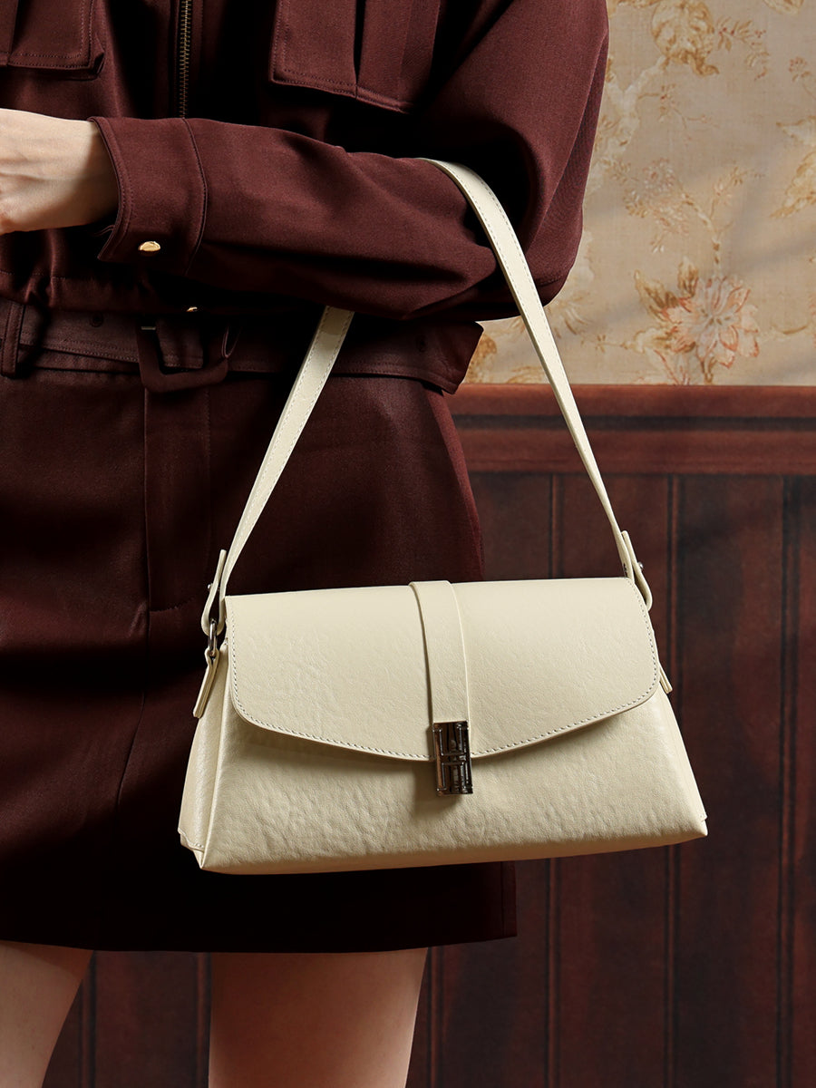 Borsa minimalista a spalla in vera pelle con fibbia H distintiva