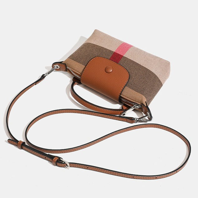 Bolso clutch bandolera de lona tejida con estampado clásico de cuadros británicos