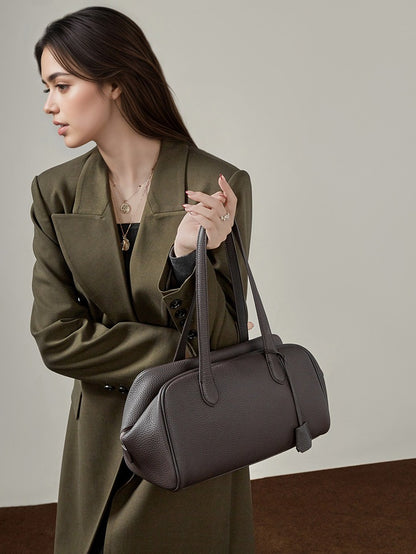 حقيبة مودرن إيست-ويست جلد طبيعي | حقيبة بولينغ بسيطة من جلد الحصى