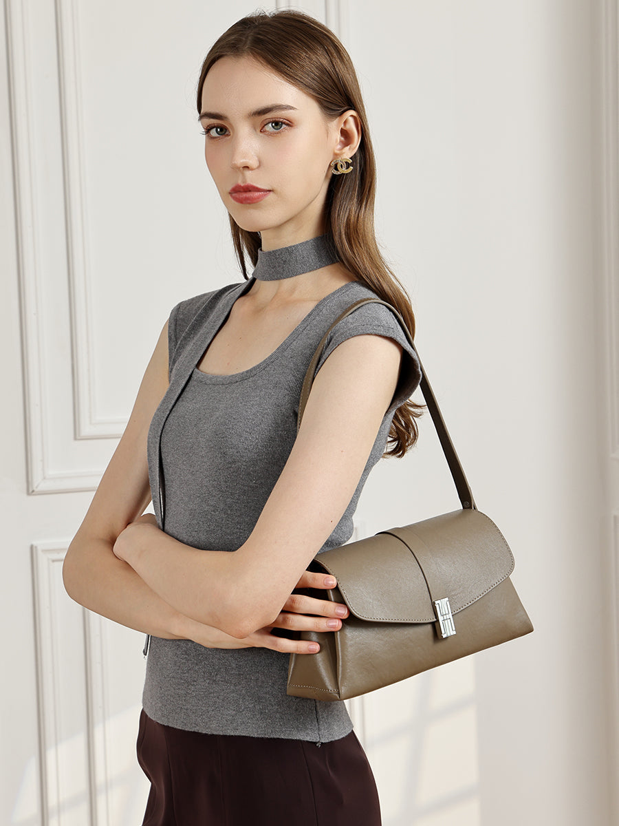 Borsa minimalista a spalla in vera pelle con fibbia H distintiva