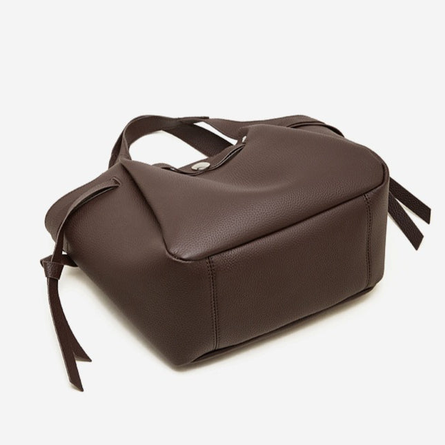 The Pebbled Genuine Leather Mini Bucket Tote Bag with Turn-Lock Closure