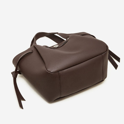 The Pebbled Genuine Leather Mini Bucket Tote Bag with Turn-Lock Closure