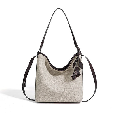 Slouchy Canvas Bucket Clutch Bag with Tassel Charm