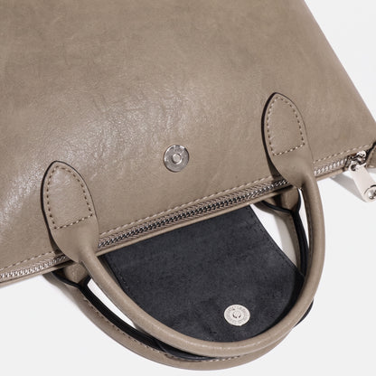 Heritage lässige Dumpling-Clutch aus echtem Leder