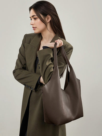 حقيبة إيثيرال في-كات جلد طبيعي | حقيبة هوبو بسيطة من جلد الحصى