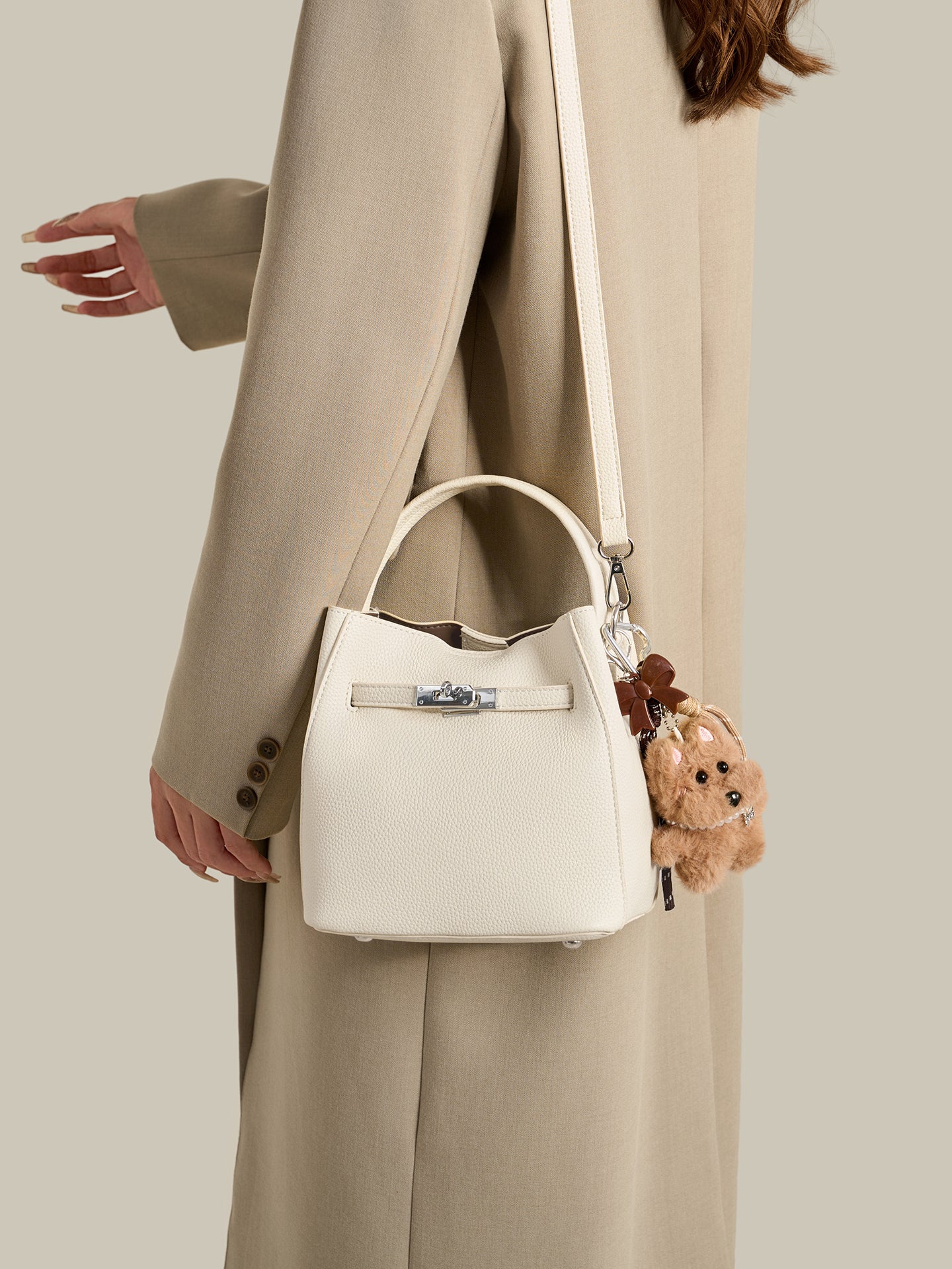 Mellow Pebble Textured Vegan Eco-Leather Bucket Bag with Fluffy Puppy Charm