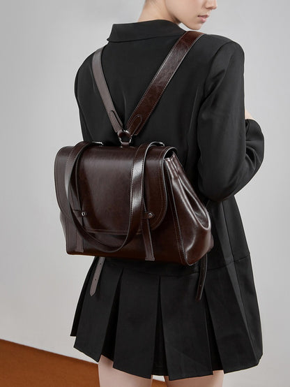 The Oil-Waxed Genuine Leather Convertible Flap Backpack Shoulder Bag
