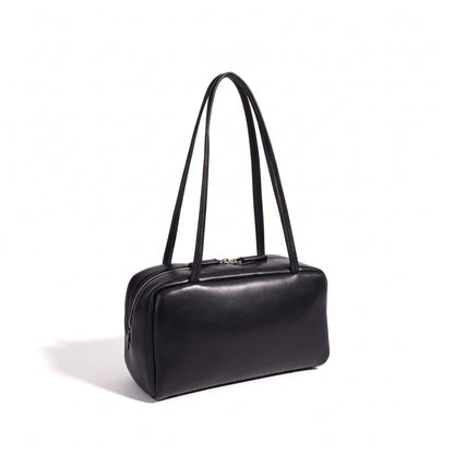 Bolso de mano tipo clutch minimalista de piel de oveja genuina con forma de bolera