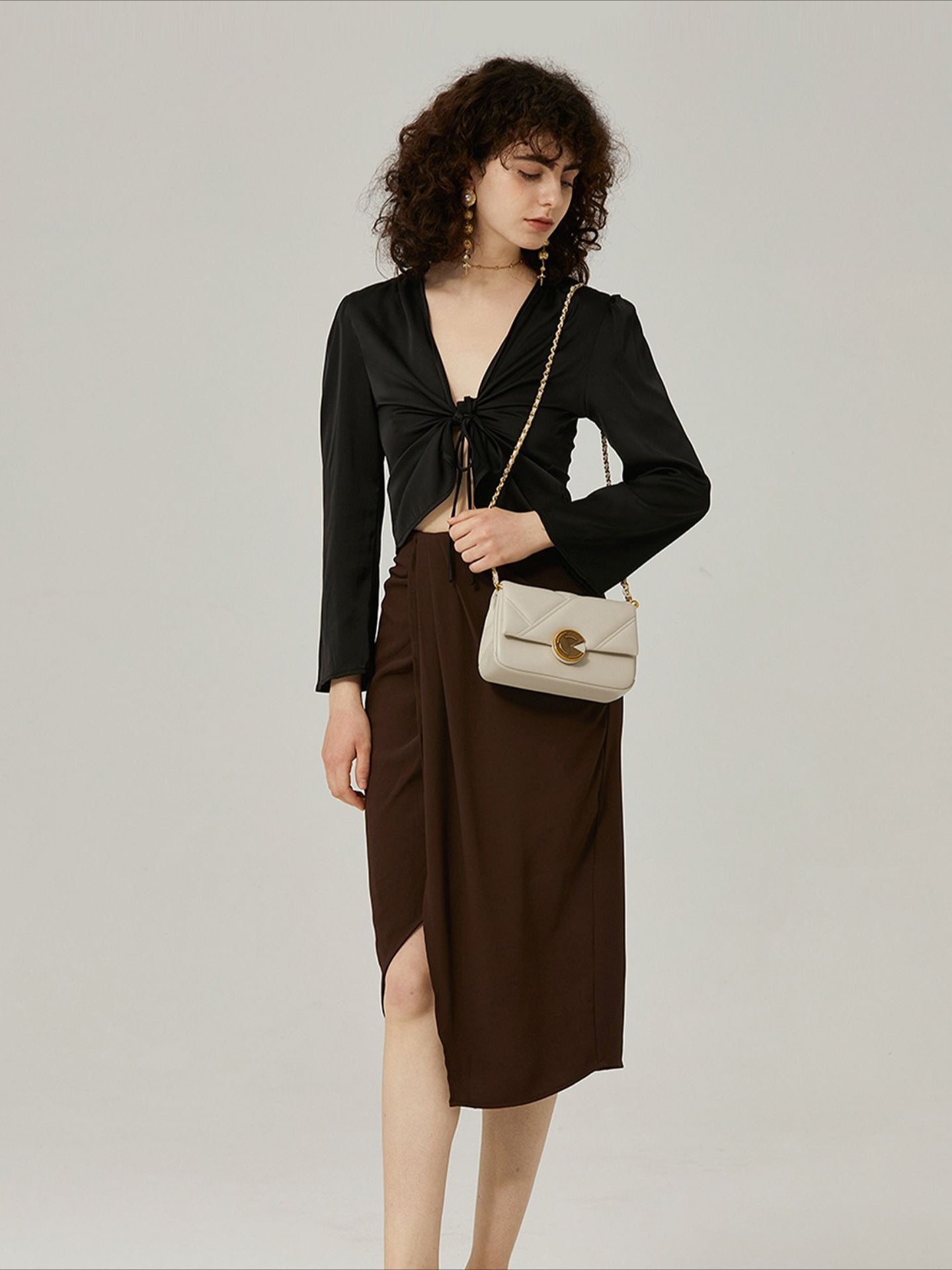 Spiral Turn-Lock Genuine Leather Quilted Crossbody Bag