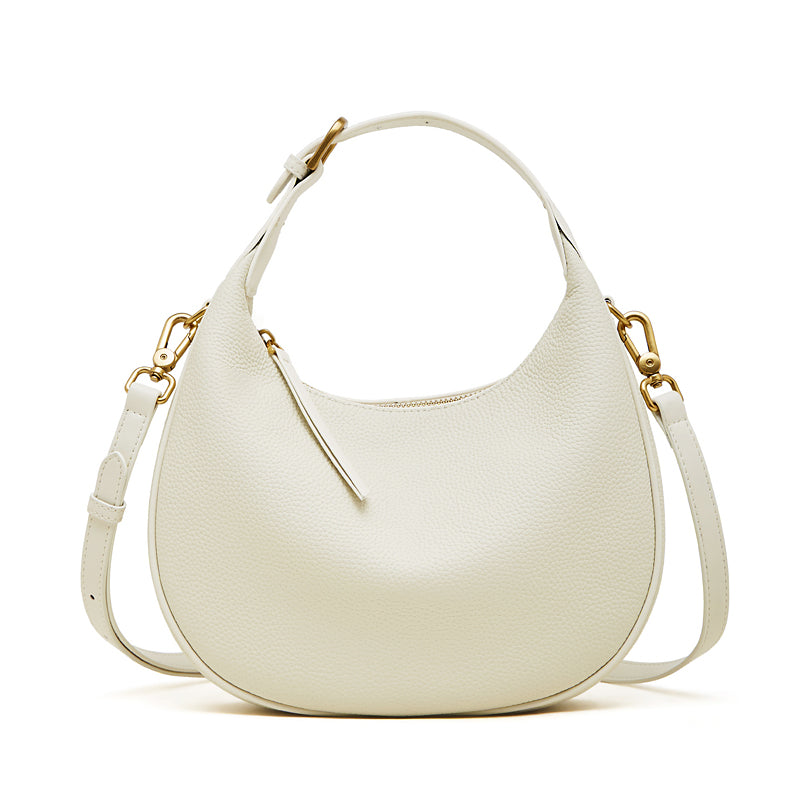 Borsa minimalista a spalla e tracolla a mezzaluna in vera pelle martellata