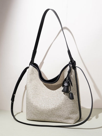 Slouchy Canvas Bucket Clutch Bag with Tassel Charm