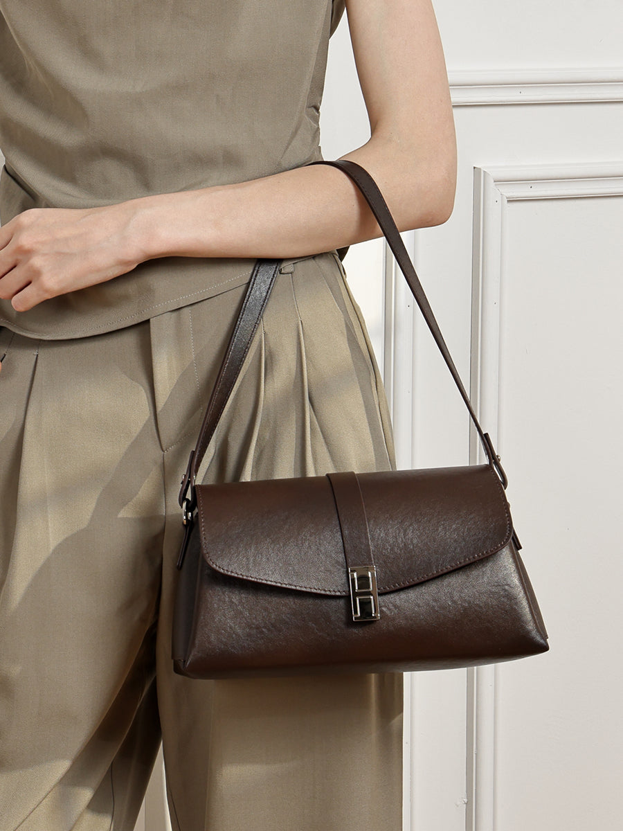 Borsa minimalista a spalla in vera pelle con fibbia H distintiva