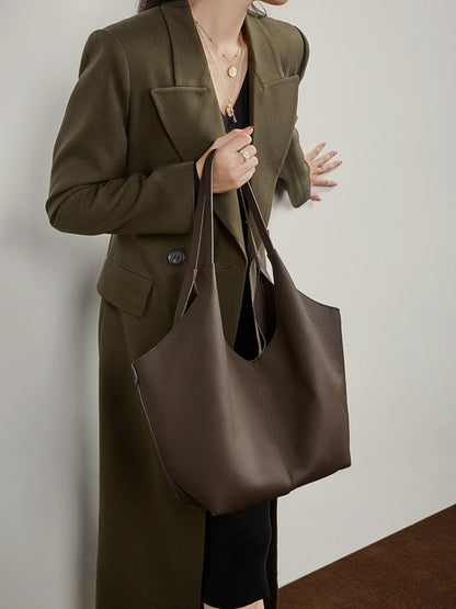 حقيبة إيثيرال في-كات جلد طبيعي | حقيبة هوبو بسيطة من جلد الحصى