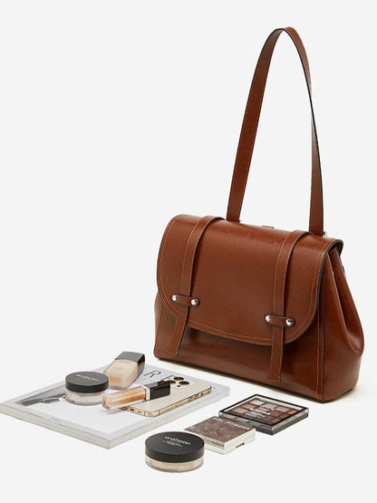 The Oil-Waxed Genuine Leather Convertible Flap Backpack Shoulder Bag