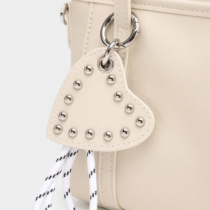 Mini tote a tracolla in vera pelle scolpita con distintivo cuore